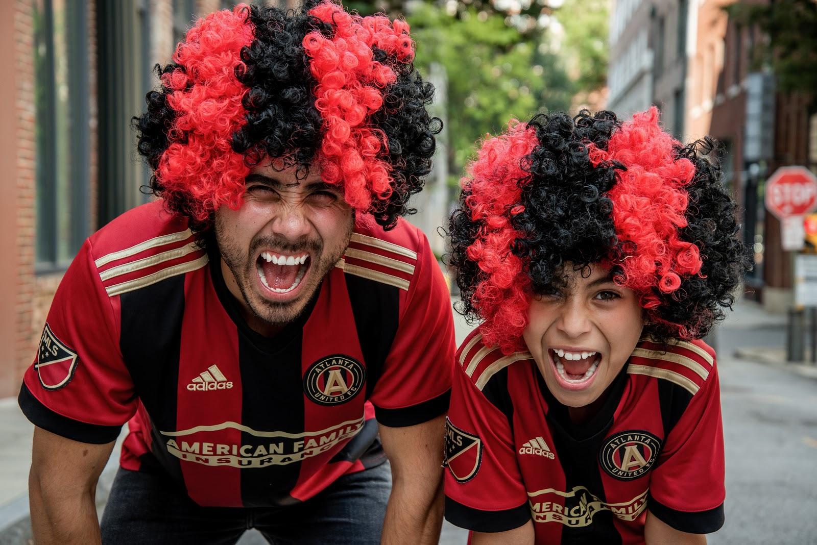 Football fans with wigs